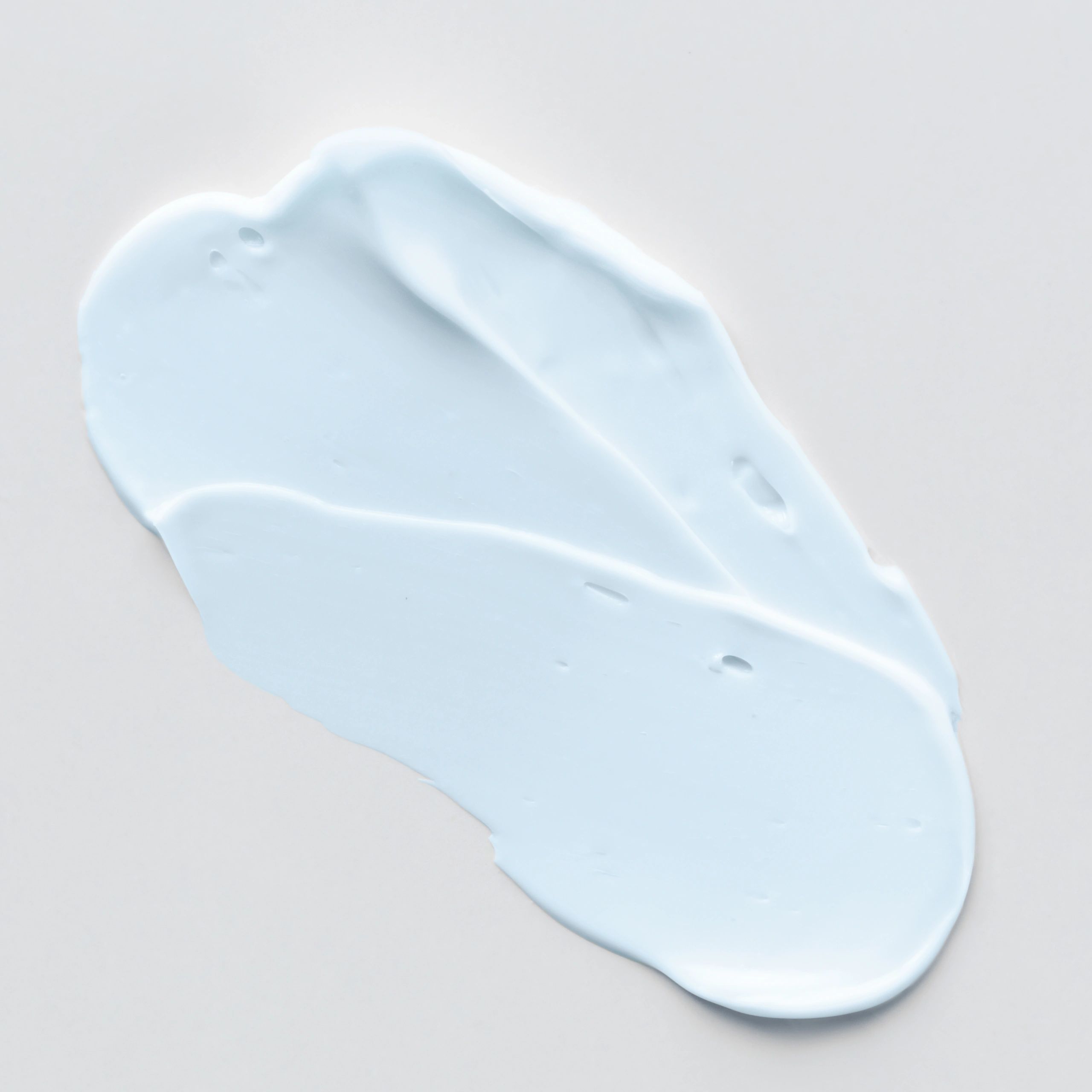 Blue cosmetic cream texture swatch